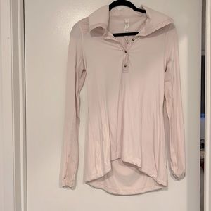 Soft pink Lululemon long sleeve pull over.  Reflection tape on back.